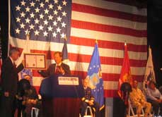 Veterans Advantage CEO Scott Higgins presents "TopVet" award to Intrepid CEO Col. Tom Tyrell