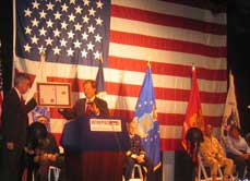 WeSalute CEO Scott Higgins presents "TopVet" award to Intrepid CEO Col. Tom Tyrell