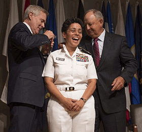 Secretary of the Navy Ray Mabus, left, and Wayne Cowles, husband of Adm. Michelle Howard