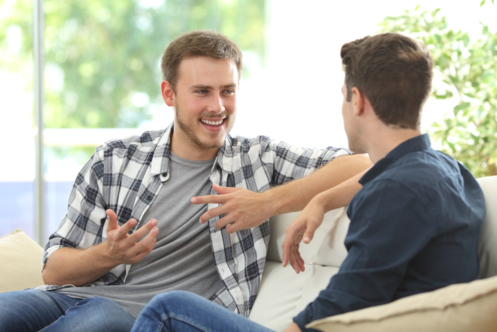 two friends chatting about job opportunities