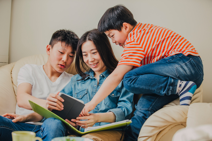 family reviewing PCS Binder