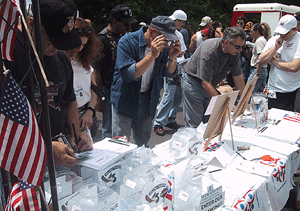 Rolling Thunder attendees line up to apply for Veterans Advantage at our special booth during the Harley Davidson barbeque