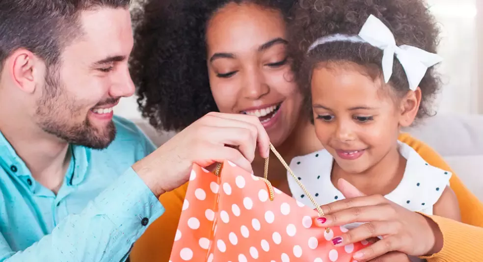 1800baskets deal hero family opens gift