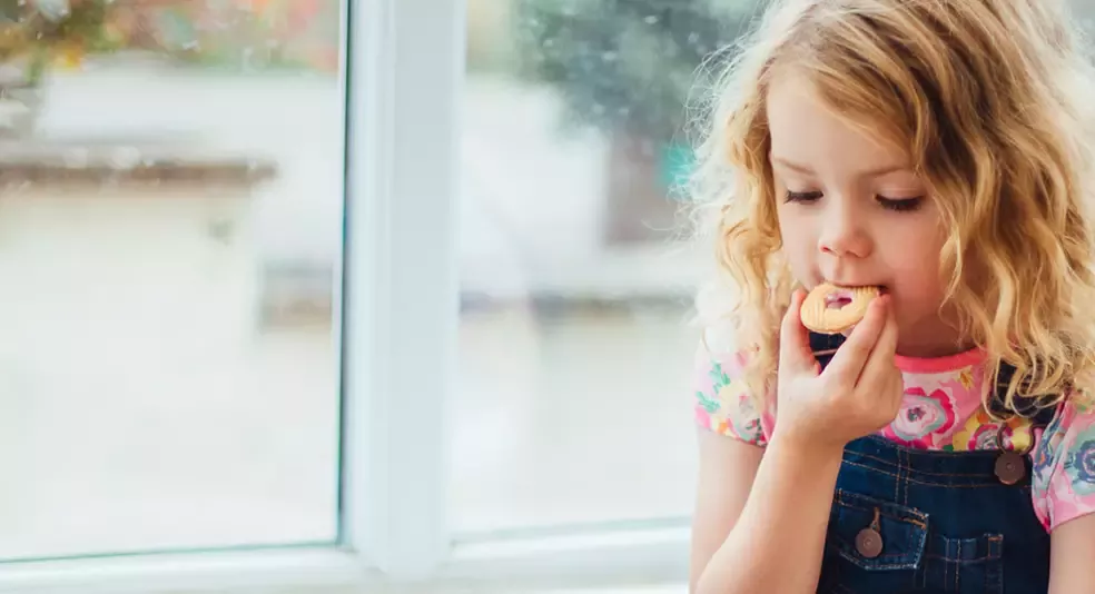 cheryl's deal hero girl eating cookie
