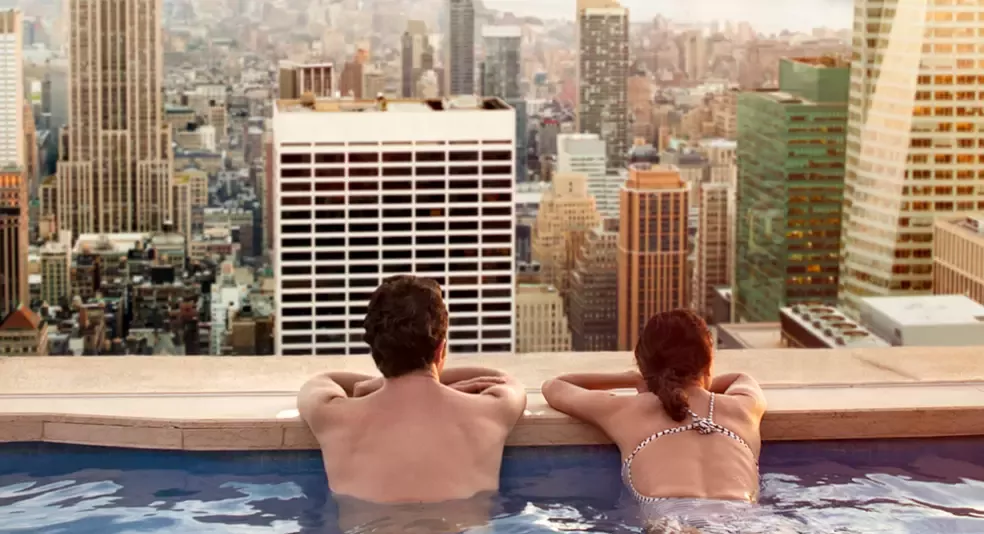 tryp deal hero couple in hotel pool