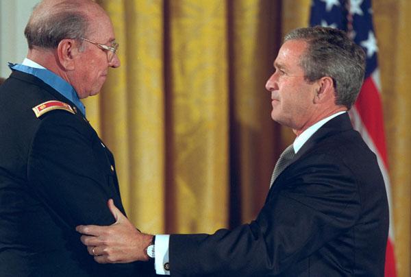 Ed Freeman receiving Medal of Honor from President George W. Bush