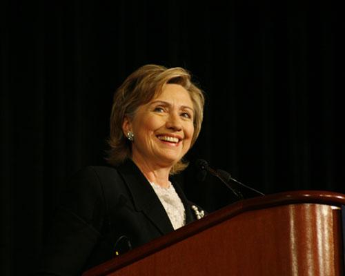 Democratic presidential hopeful, Sen. Hillary Rodham Clinton, D-N.Y., is accompanied by MTV News Correspondent Sway Calloway as she arrives for a taping of "Choose or Lose" where she met with Iraq and Afghanistan Veterans at Lancaster Brewing Company in Lancaster, Pa., Tuesday, March 18, 2008. 