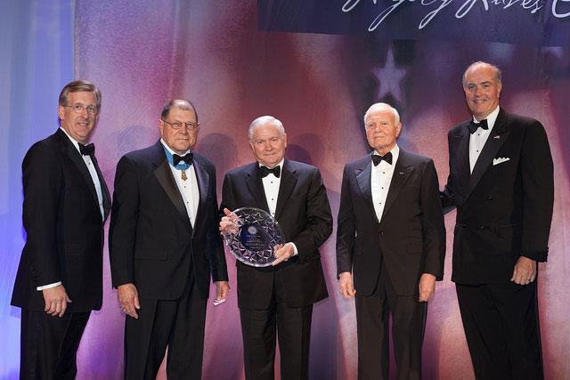 TriWest CEO David McIntyre, Hal Fritz (MoH Recipient), Secretary Gates, Bruce Whitman and Co-Chairman of the CMoH Foundation. Tom Matthews (Co-Chairman, CMoHF)