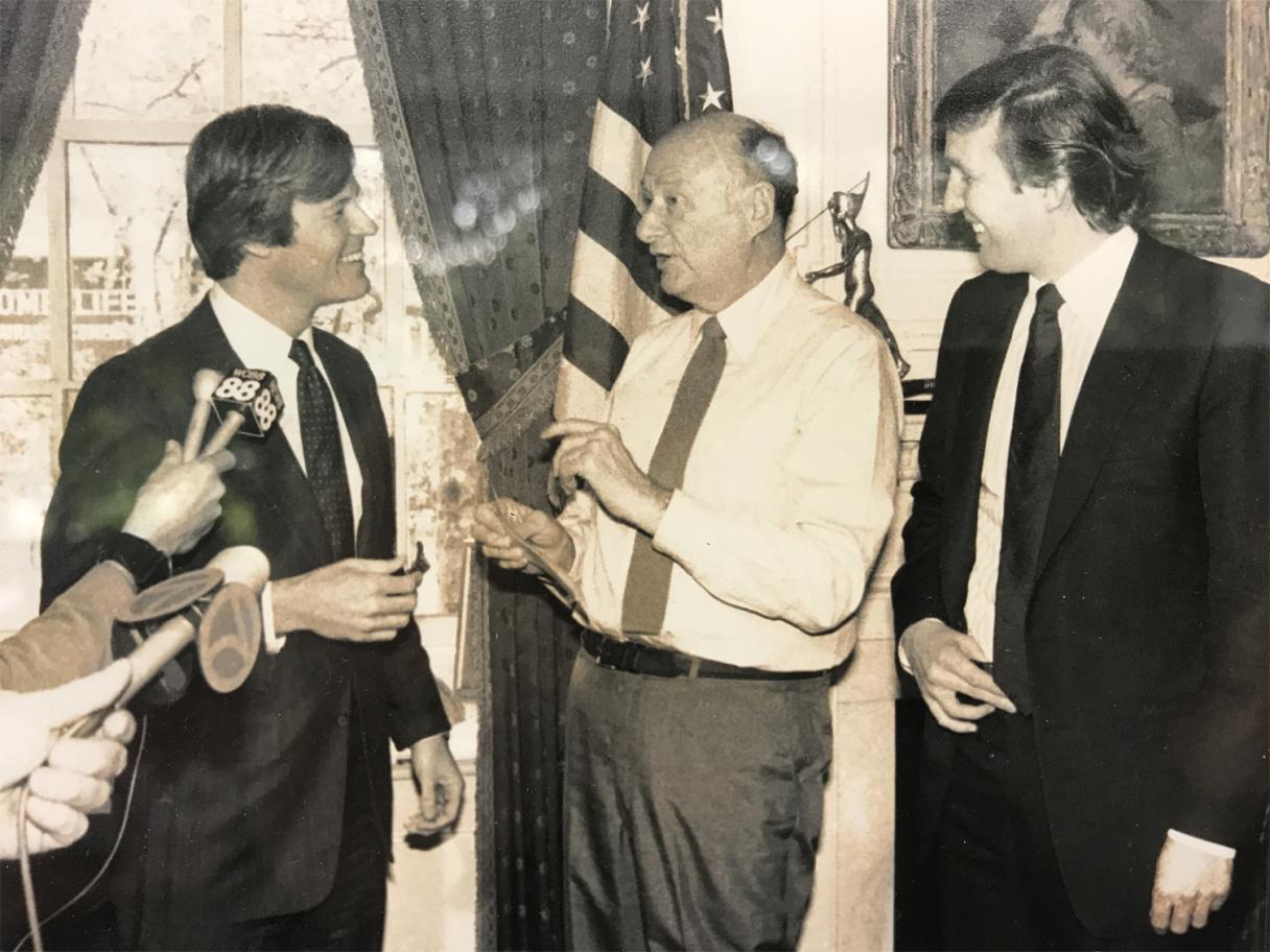 NYC Mayor Ed Koch, WeSalute (Veterans Advantage) CEO Scott Higgins, and Donald Trump at a press conference 