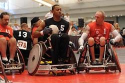 Veterans competing in quad rugby.