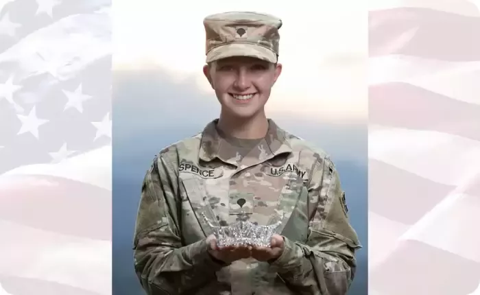 Spc. Maura Spence with her Miss Colorado Crown (U.S. Army photo by Spc. Matthew Marsilia)