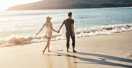 couple walking in the beach
