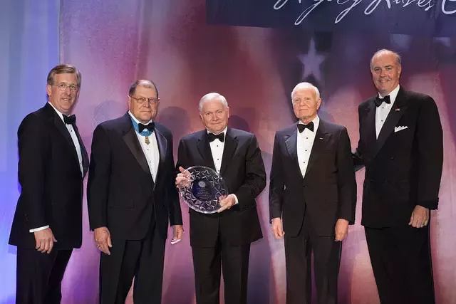 TriWest CEO David McIntyre, Hal Fritz (MoH Recipient), Secretary Gates, Bruce Whitman and Co-Chairman of the CMoH Foundation. Tom Matthews (Co-Chairman, CMoHF)