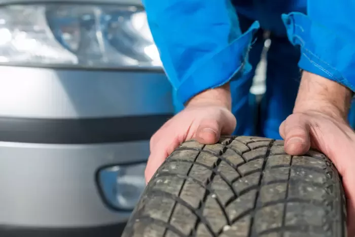 mechanic working on car