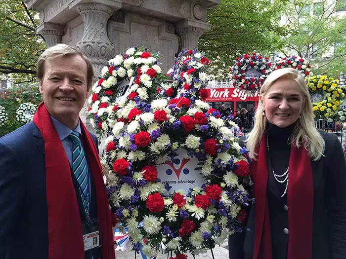 Veterans Advantage Founders Scott and Lin Higgins with the company's memorial wreath.