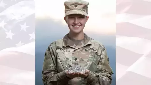 Spc. Maura Spence with her Miss Colorado Crown (U.S. Army photo by Spc. Matthew Marsilia)