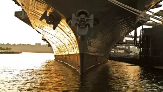aircraft carrier at dock in New York