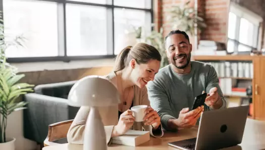 couple in front of laptop