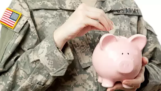American Soldier with Piggy bank