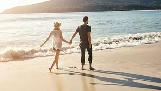 couple walking in the beach