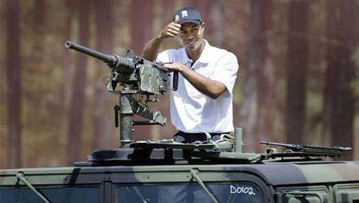 Tiger Woods arrived in a humvee during a golf clinic at Stryker Golf Course at Fort Bragg, N.C. Chuck Burton, AP
