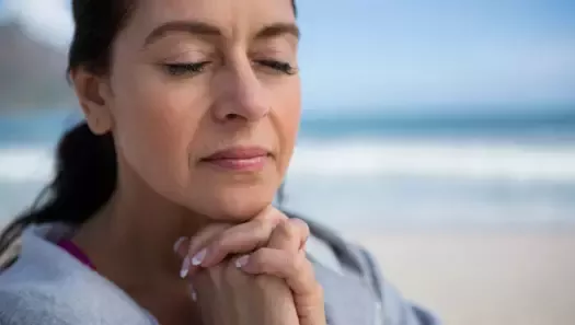 Woman pauses for a moment of silence