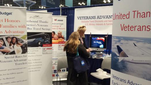Co-Founder and Chief Operating Officer Lin Higgins helping an attendee enroll in Veterans Advantage at the New York Times Travel Show.