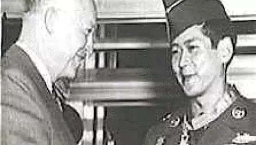 President Dwight D. Eisenhower congratulates Staff Sergeant Hiroshi H. Miyamura upon his much-belated receipt of his Medal of Honor during the formal award ceremony at the White House on October 27, 1953 Courtesy of National Archives